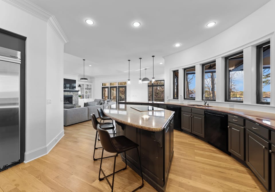 Wide view of the open-concept kitchen and casual dining area.