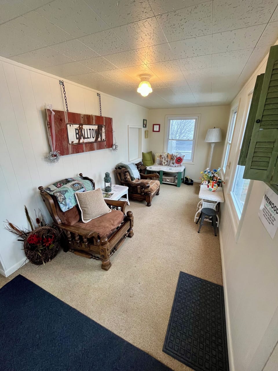 Sunroom.
Games under corner bench.