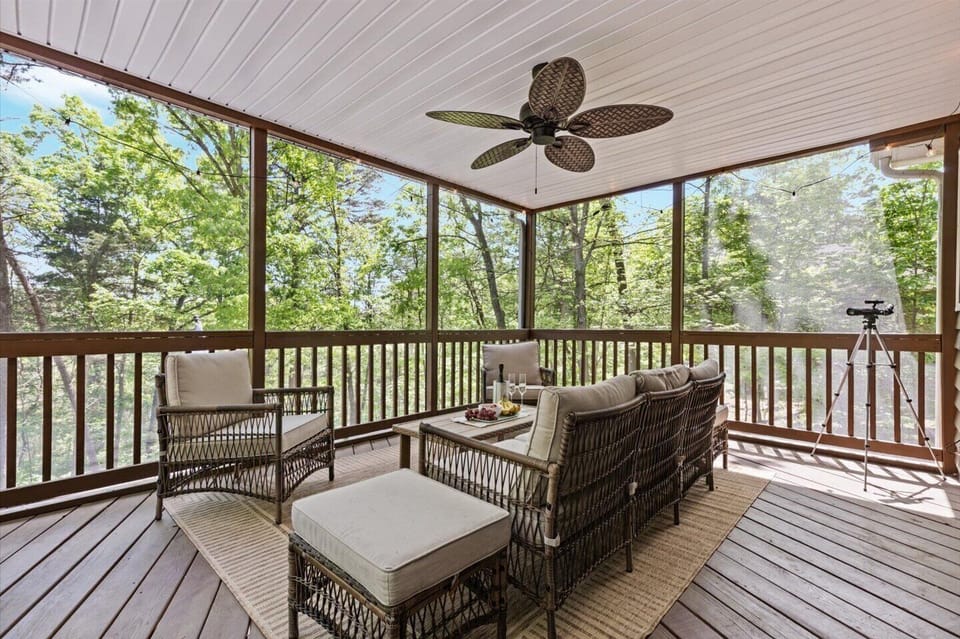Our guests love the screened in porch complete with seating for five. 