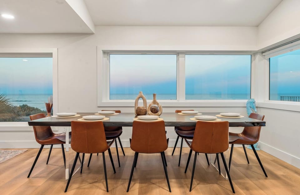 Ocean view dining for eight on a custom live edge table