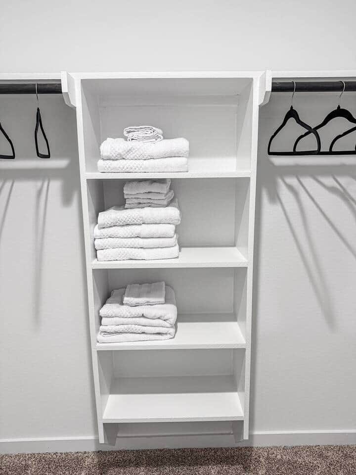 Extra towels located in the Primary Bedroom closet. Hang your clothes or store your luggage in this room as well. 