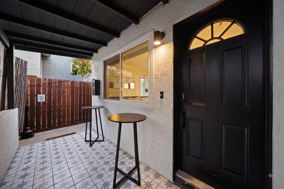 Private patio entrance with outdoor seating – great for morning coffee