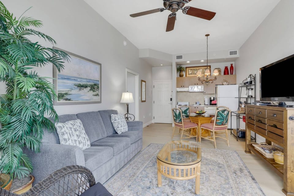 The sleeper sofa in the living room has a queen bed, sleeping up to 2 guests.