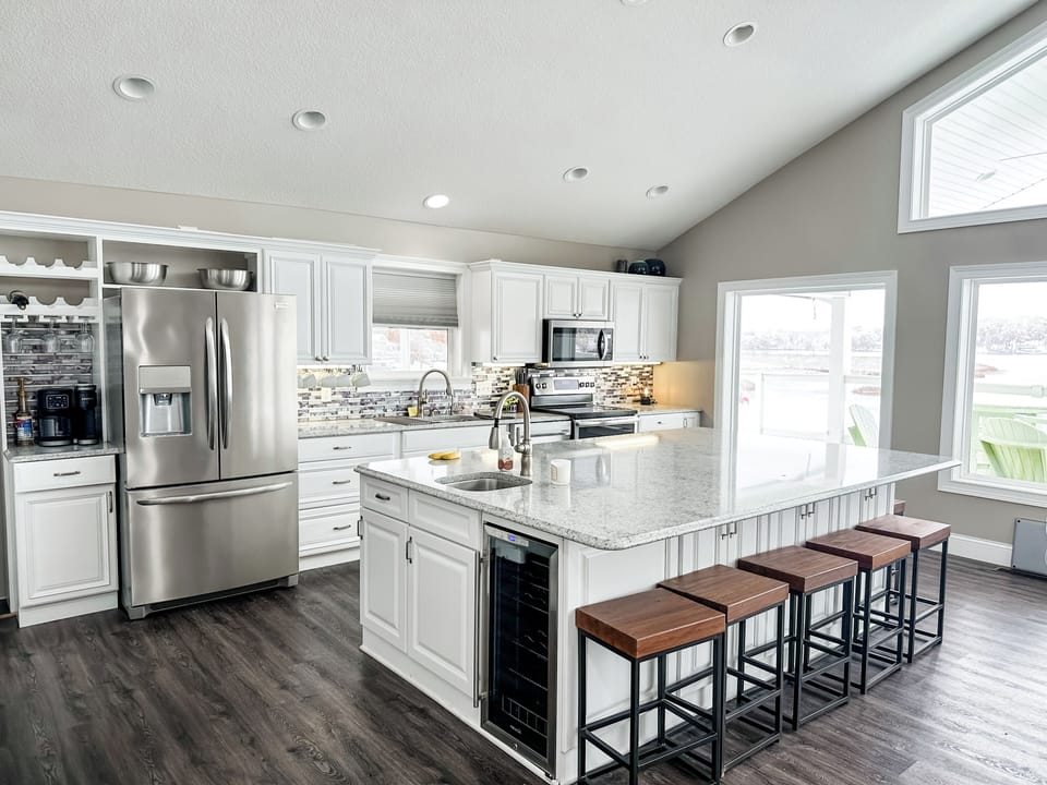 Seating for eight at the giant bar makes the perfect spot for gabbing and snacking. 