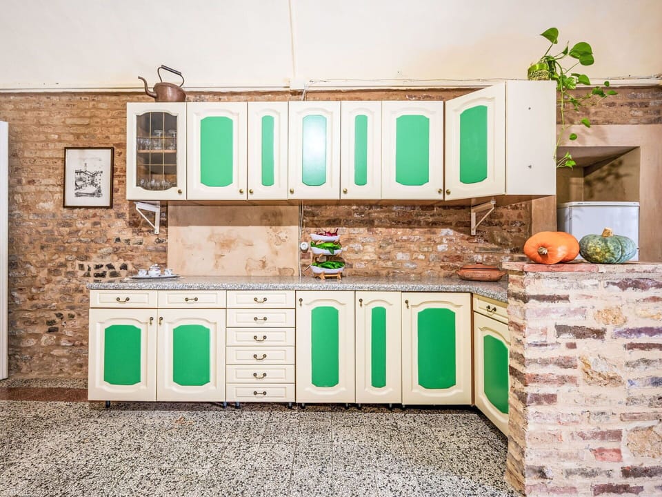 Interior Design, Kitchen, Flooring, Cabinetry, Countertop, Wood Stain, Paint, Major Appliance, Cupboard, Drawer