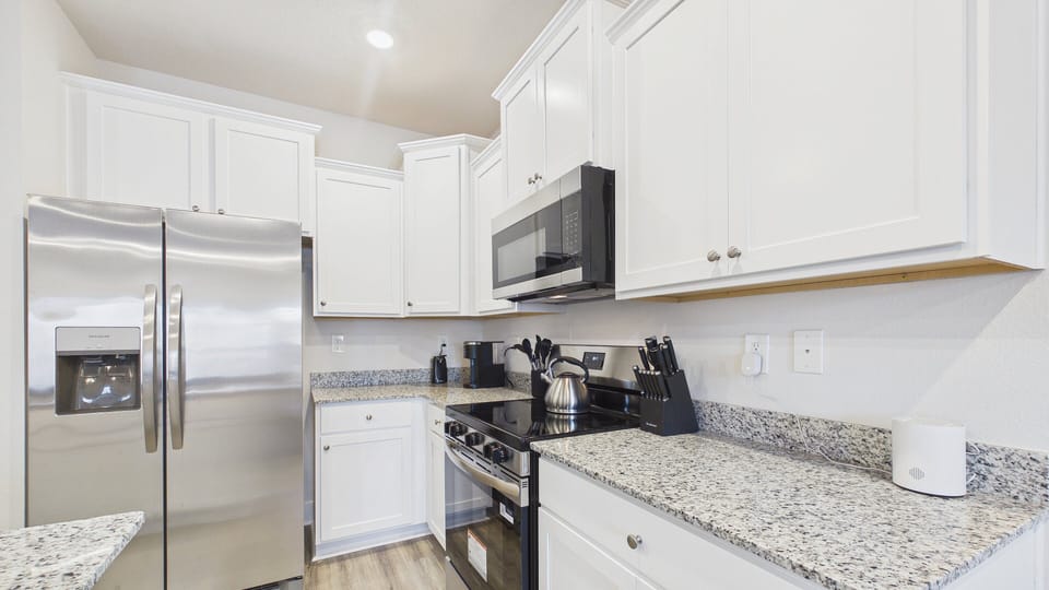 Fully applianced kitchen with stainless appliances and all the cooking essentials for your stay