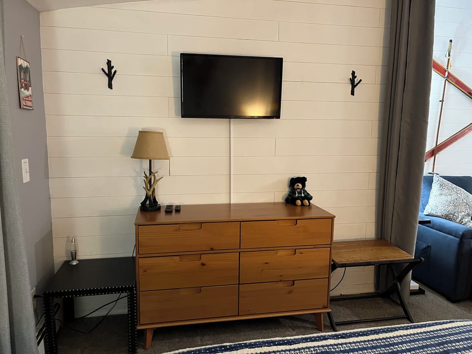 New dresser and wall hooks for ample storage!