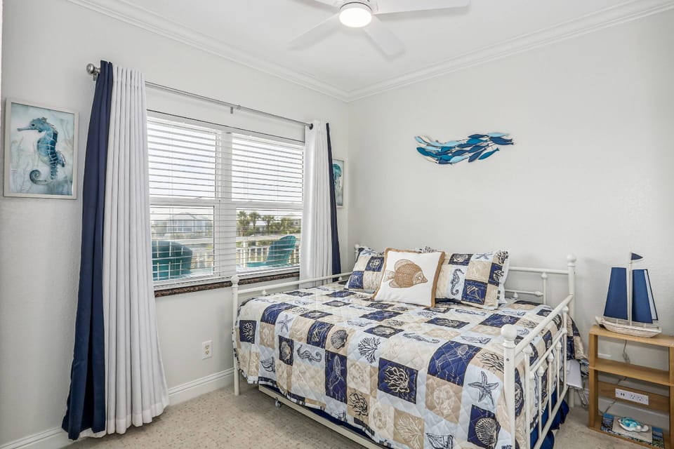 Front bedroom with a full bed and twin pull out trundle