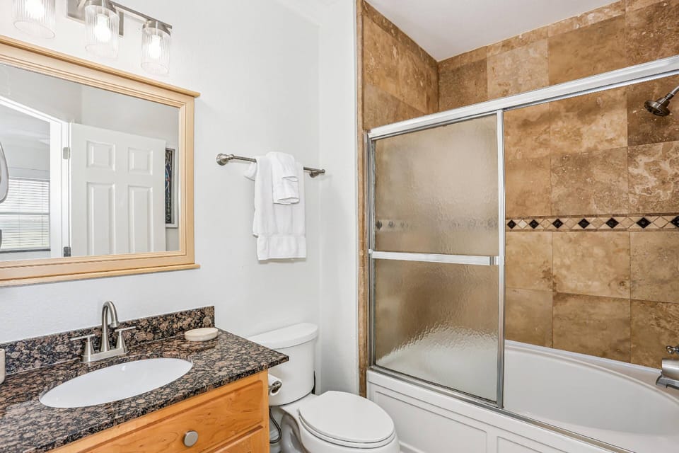 Large soaking tub with shower in the primary bathroom