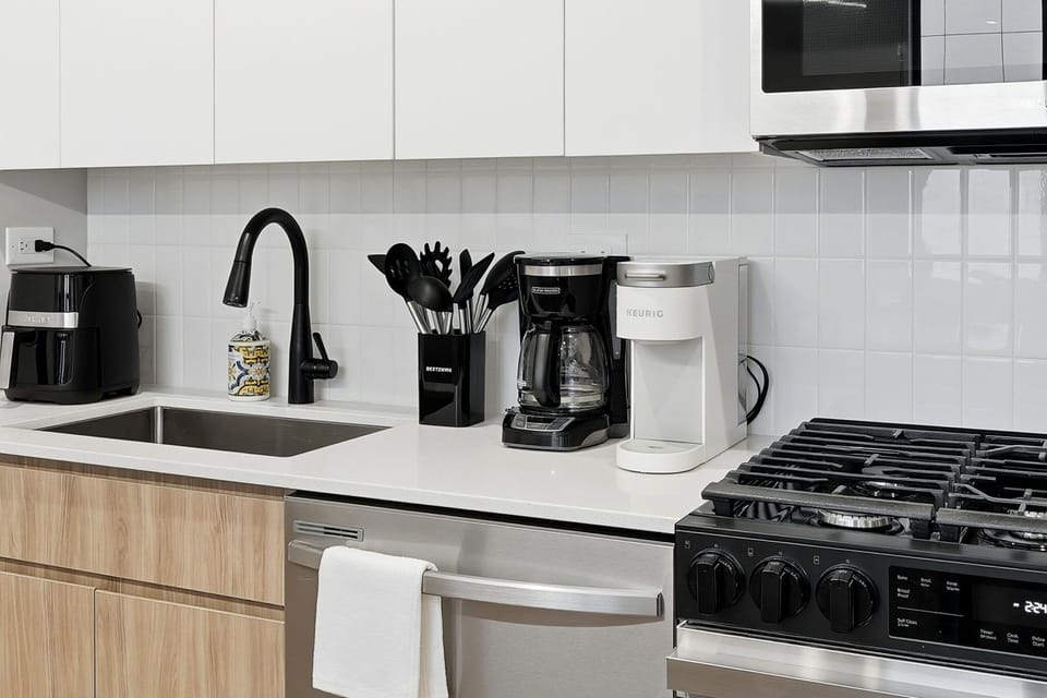 Coffee station area w/ clean counters & easy access to essentials