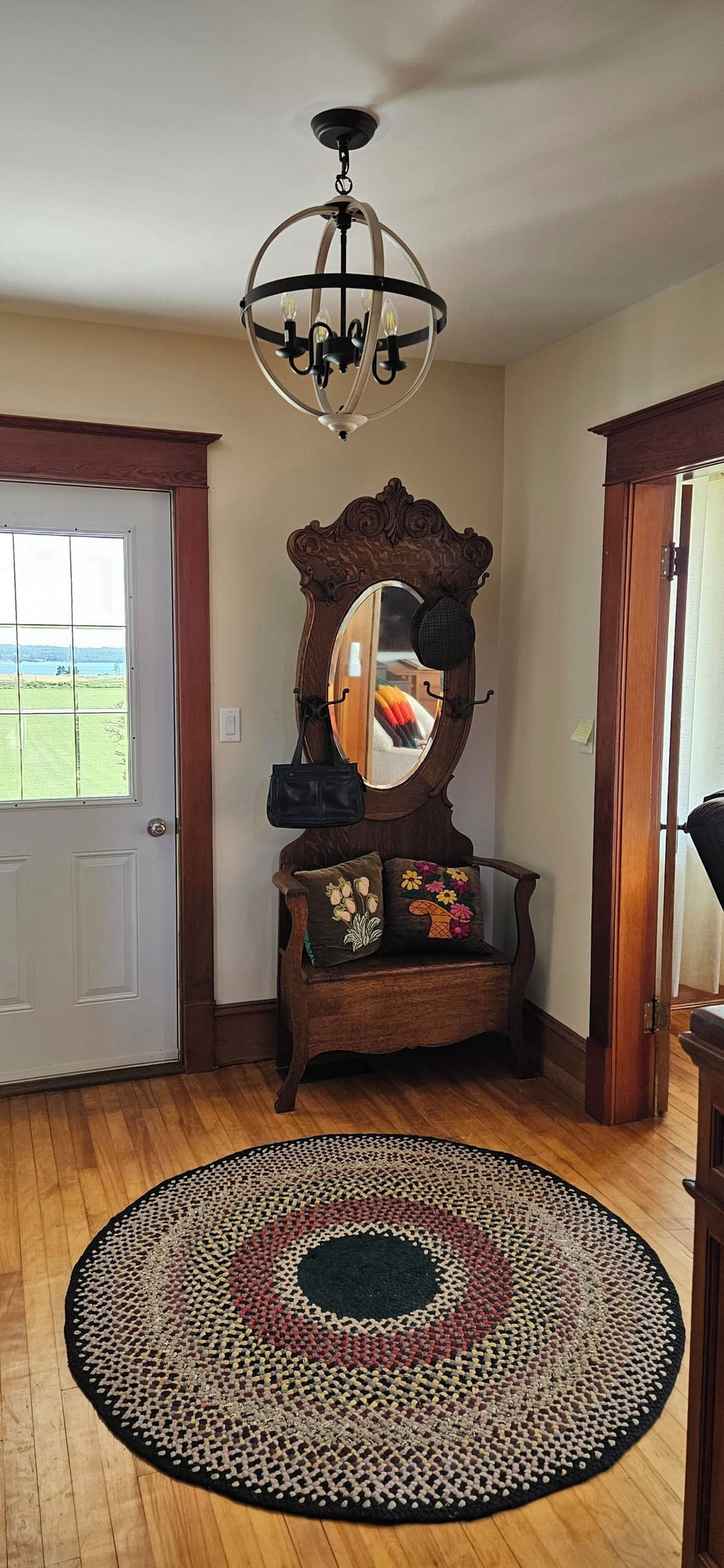 The front door and coat tree that is original to the house.
