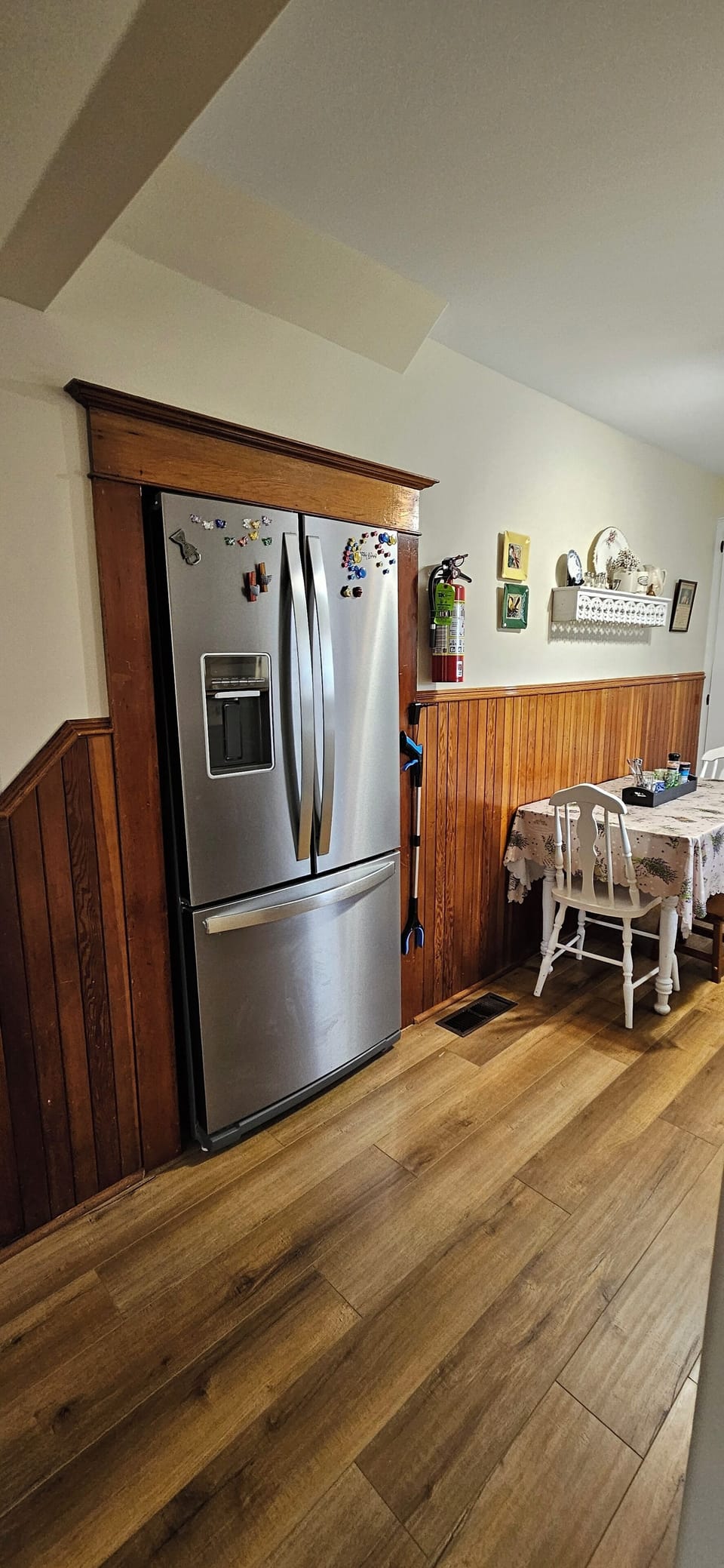 The kitchen has a brand new fridge.