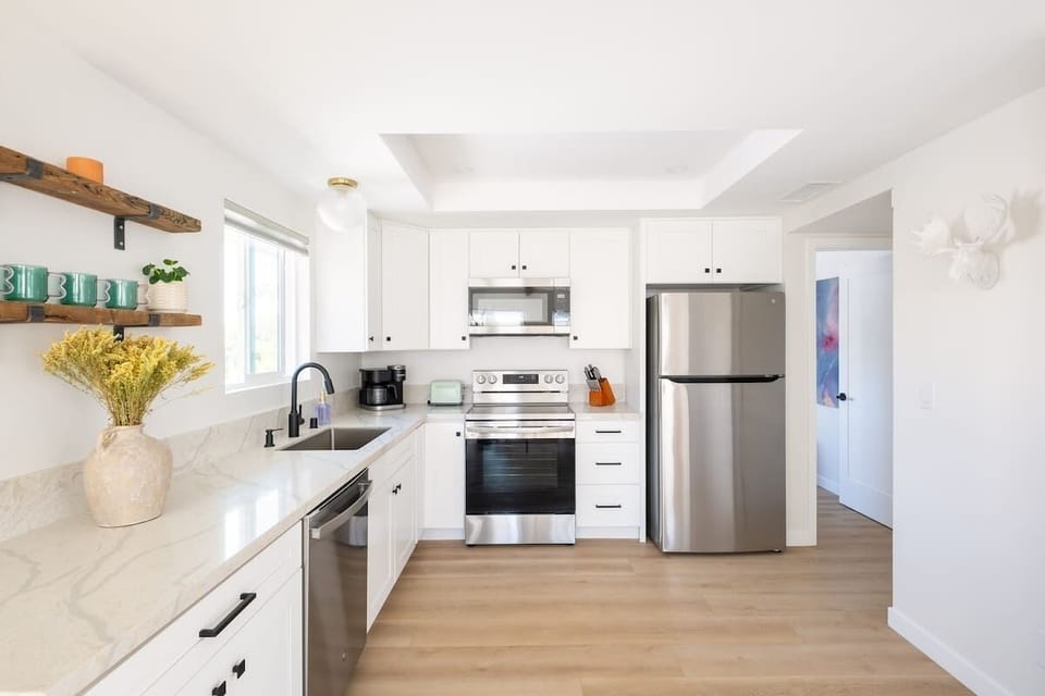 The sunny kitchen comes fully equipped with everything you could need