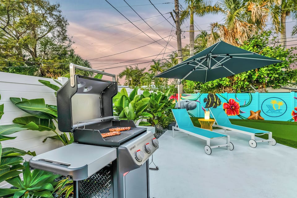 Premium grill setup, complete with OXO tools—tongs, meat fork, spatula, & more.