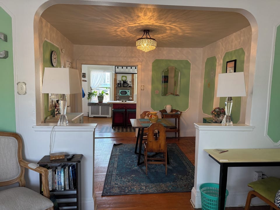 View of the dining room and kitchen from the living room