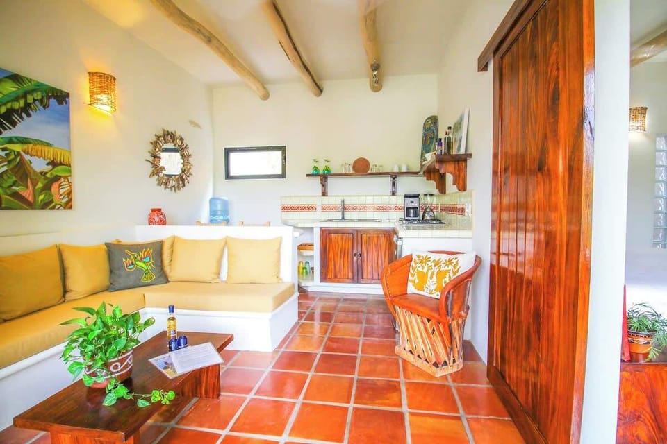 Living room with sofa and kitchenette