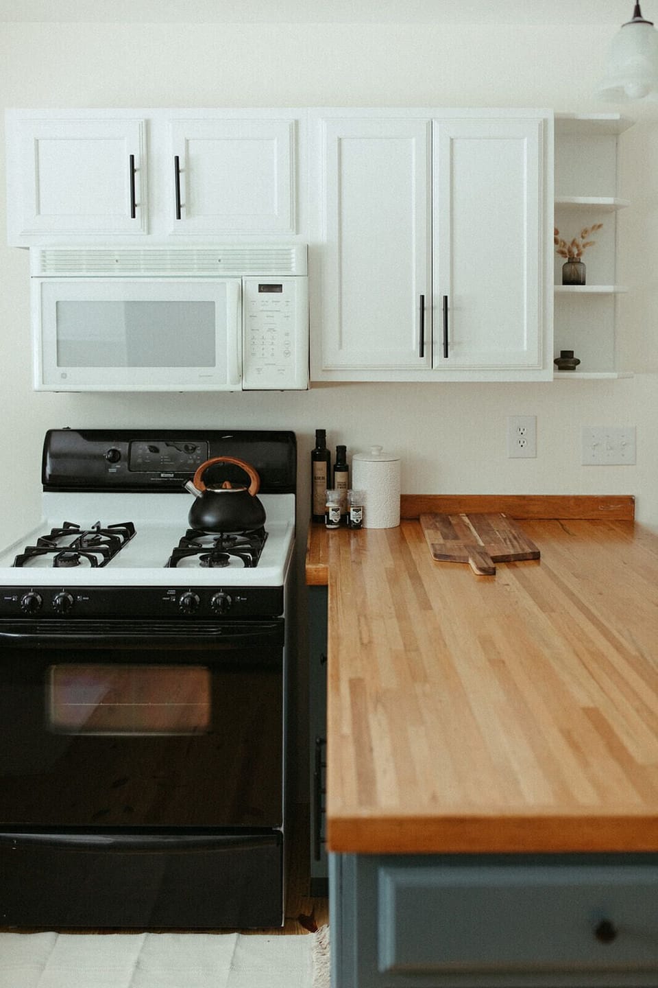 Cooking area with stove, counter space, and essentials for simple meals or full group dinners.