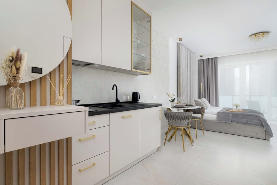 Cook and dine in style with the modern kitchenette and dining area.