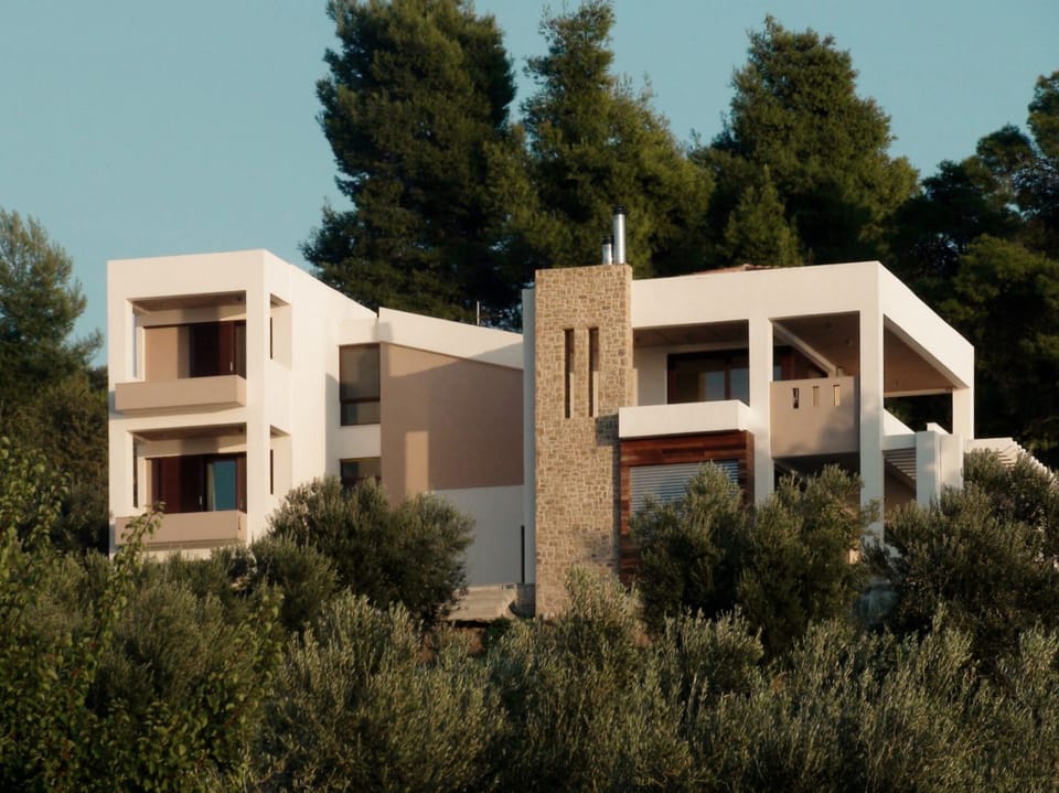 Exterior view of the house integrated into the natural hillside