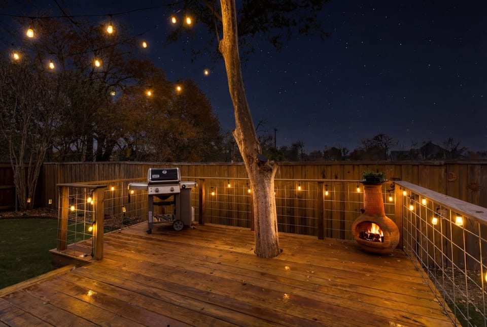 Have a Drink with friends or Grill a Steak on this beautiful lighted back deck.