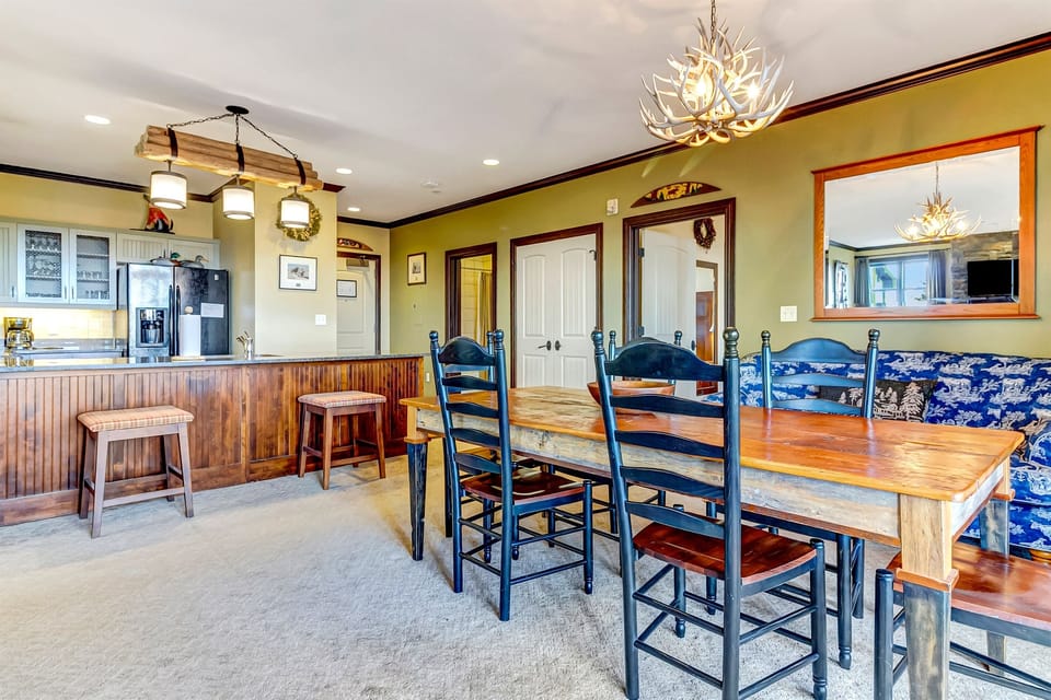 Dining space flowing into the kitchen for easy meals together.