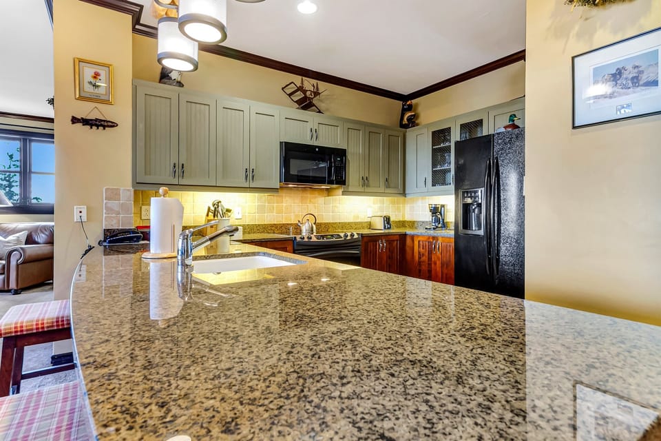 Warm kitchen w/ ample counter space for cooking together.