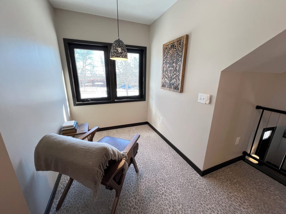 This lovely nook provides a lakeview... perfect for reading or morning coffee!