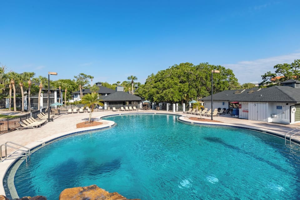Unwind to soothing water sounds at the pool’s edge.