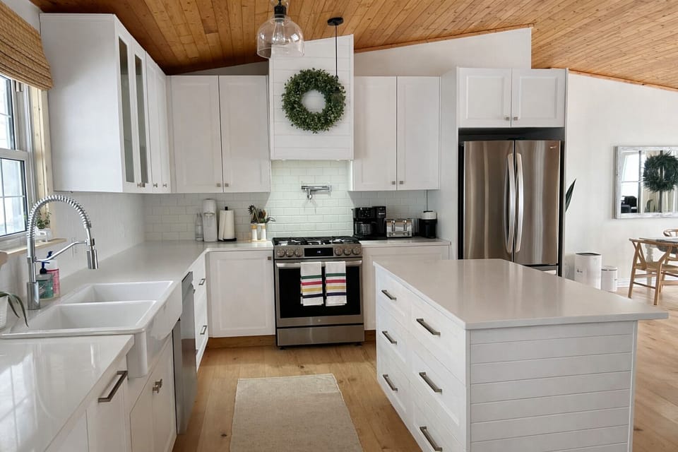Full kitchen, completely renovated with white quartz countertops