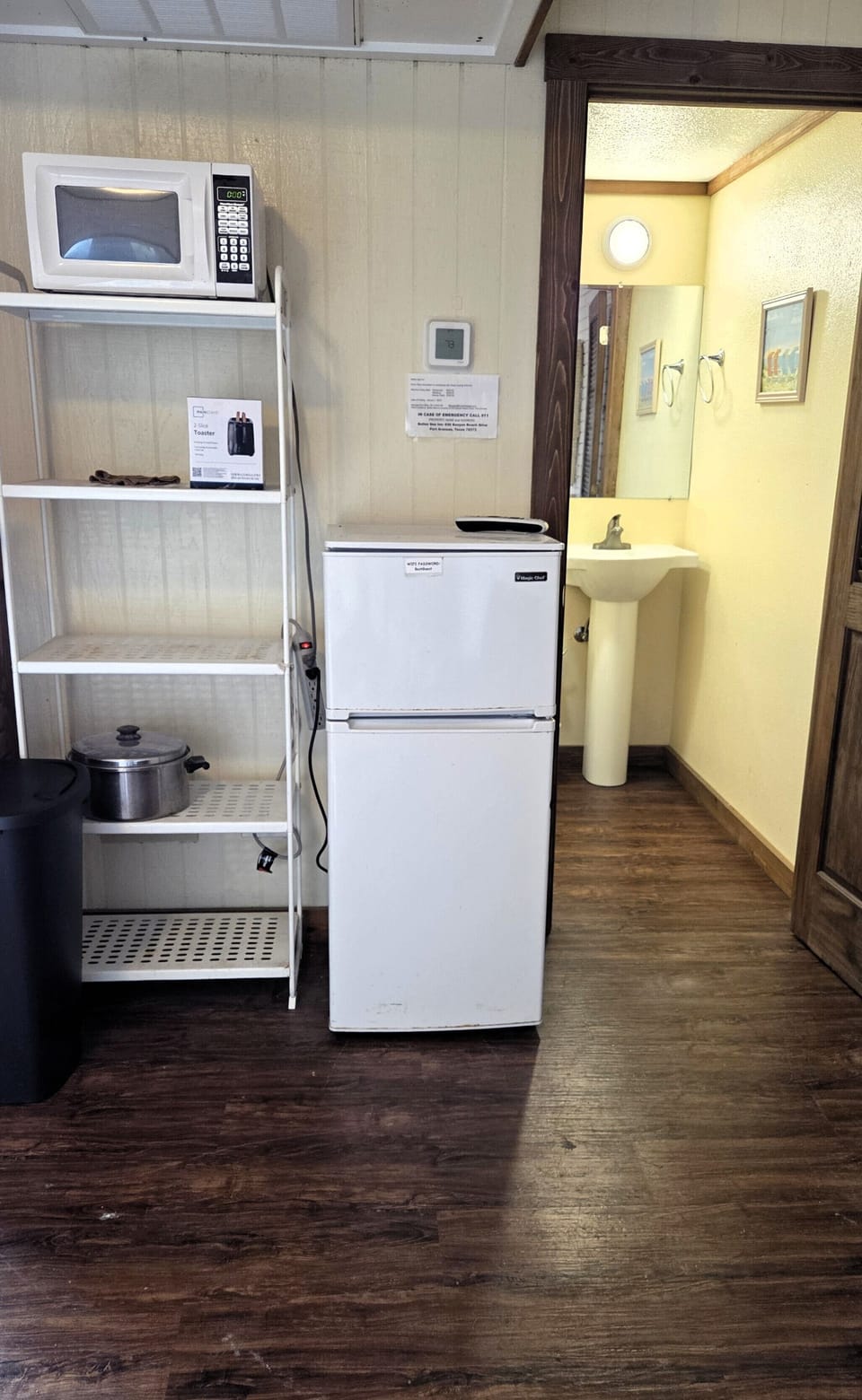 The studio has a small refrigerator/freezer, microwave, and coffee maker
