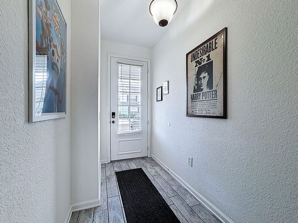 Bright entryway with natural light, modern décor, and easy access to the home.
