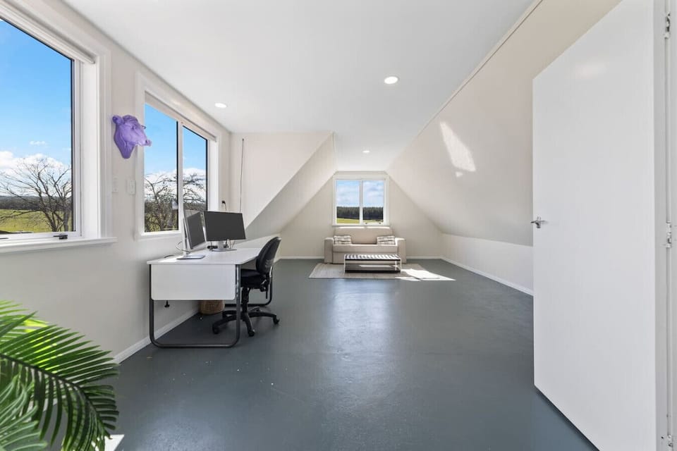 Extra lounge/rumpus room upstairs, with sofa bed and desk, please note this area is above garage - separate from other upstairs area - these stairs are not accessible for elderly or young children