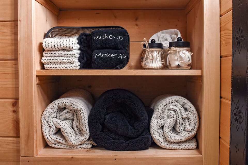 Bathroom is stocked with towels and lots of extras including a blow dryer.