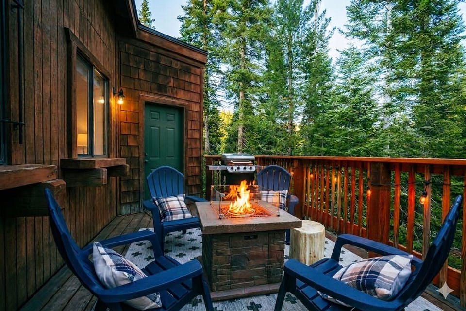 Enjoy the BBQ deck with propane fire pit and Adirondack chairs for cozy evenings