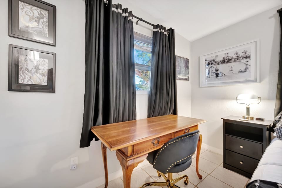Dedicated workspace with desk, WiFi, and natural light