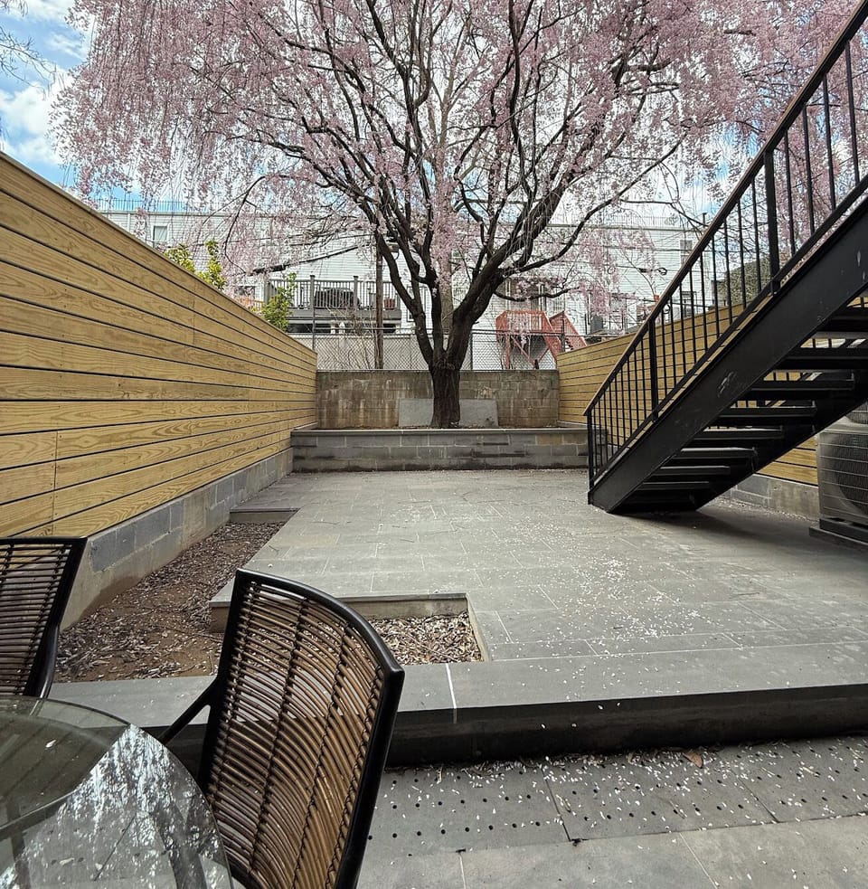 Backyard Garden with cherry blossom tree