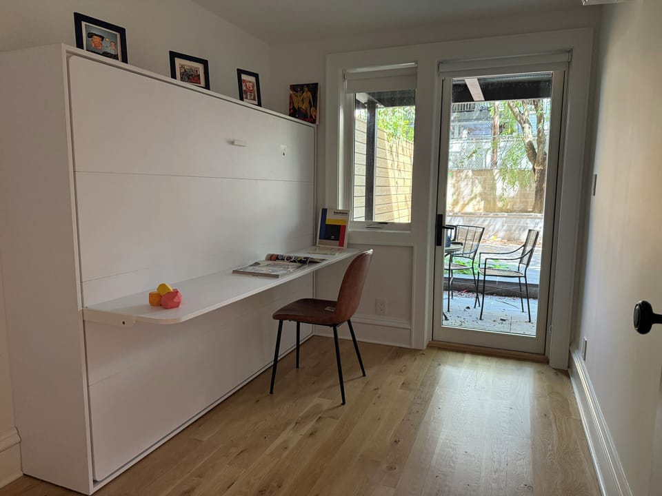 2nd bedroom / private office with pull down desk / queen murphy bed. 