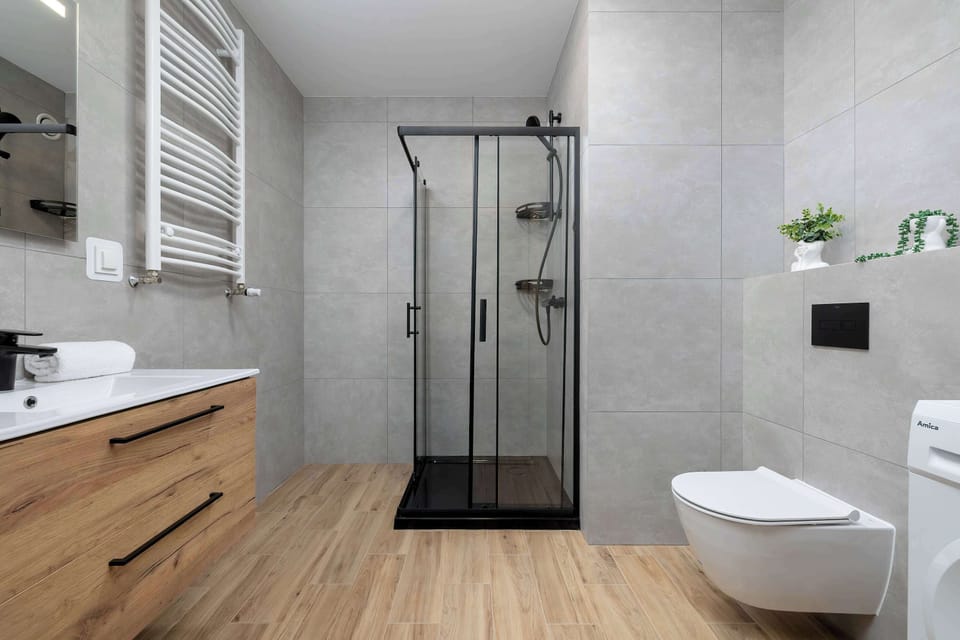 The bathroom offers a clean and functional space for your stay.
