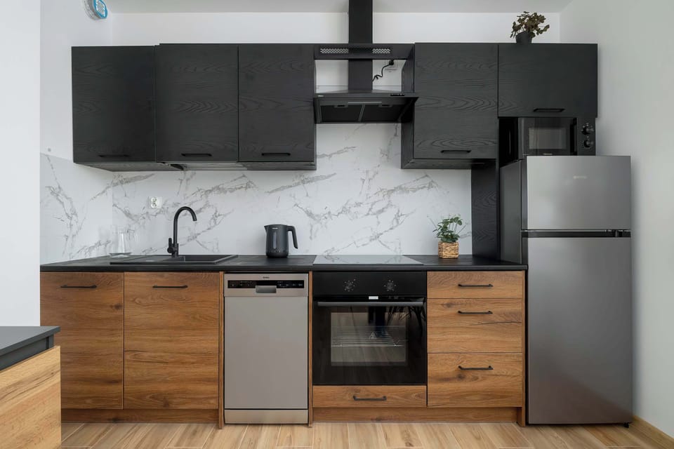 The kitchenette's practical layout maximizes space and functionality.