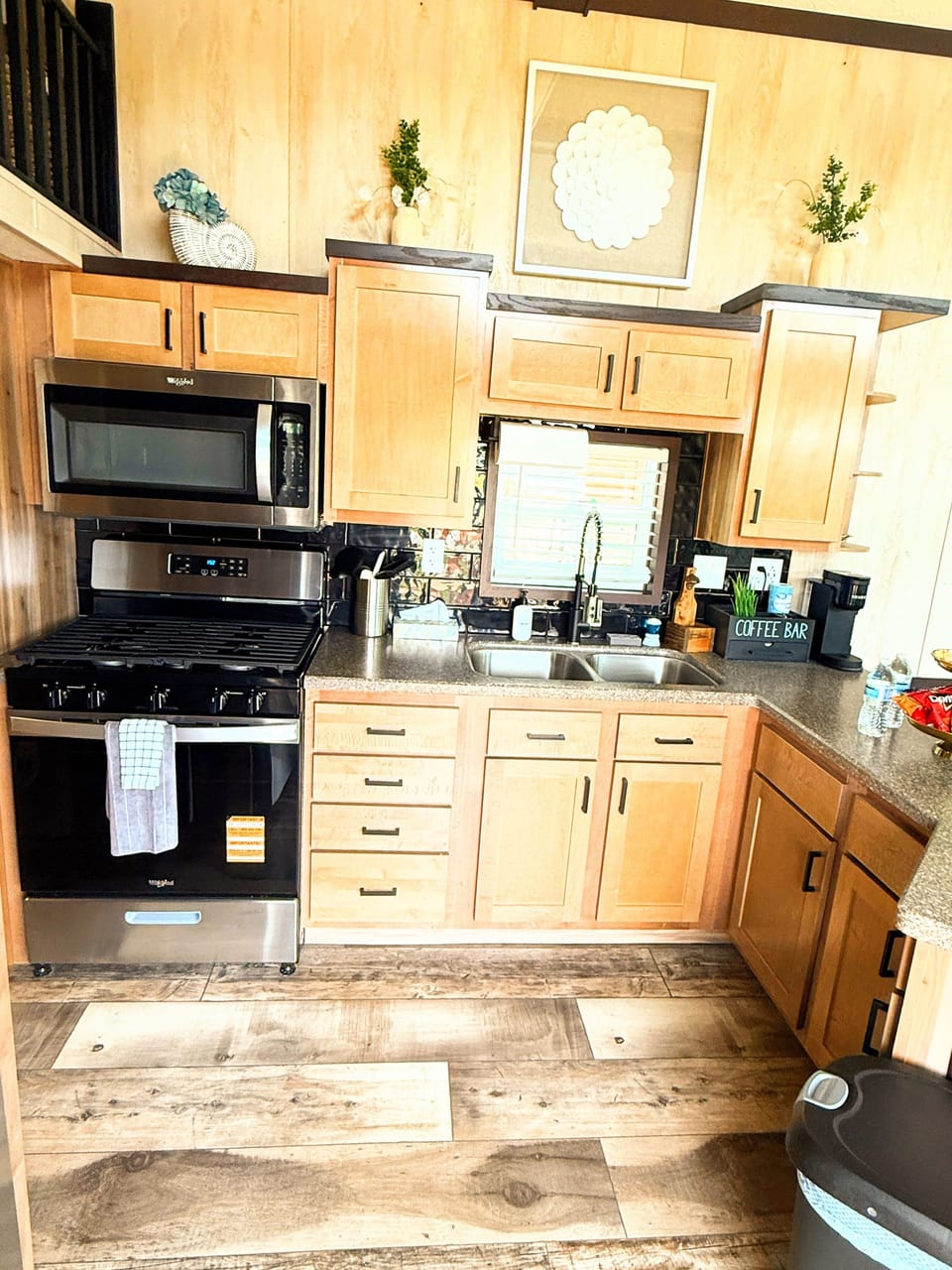 Funky Island - Another view of the kitchen highlighting the oven with a convenient microwave above.