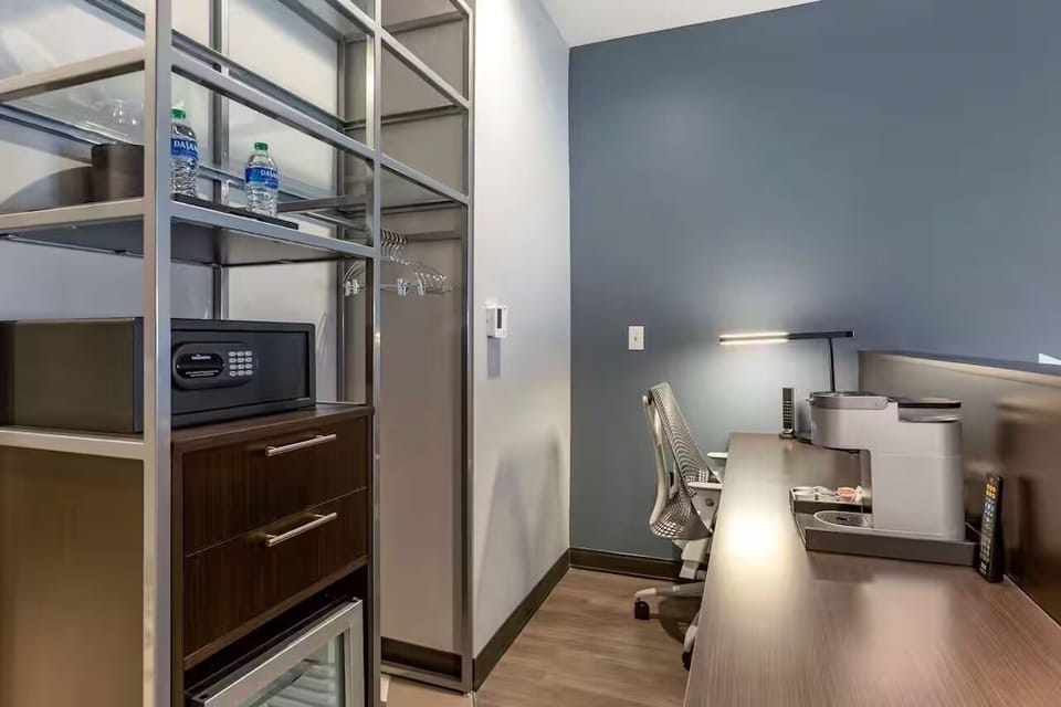 Organize effortlessly with open shelving and a practical workspace.