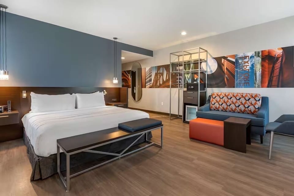 Kick back after meetings with big-screen entertainment and workspace.