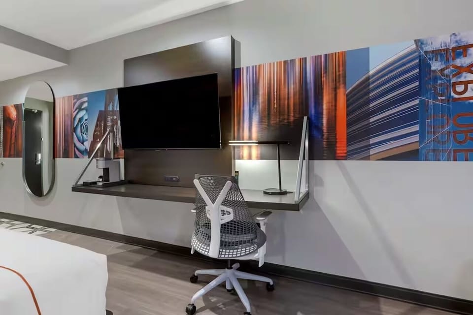 Get focused at the ergonomic desk with streaming-ready TV.