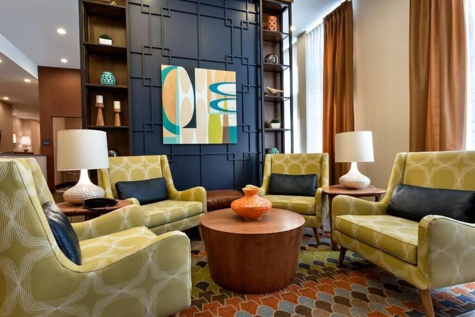Settle into the bright lobby with spacious seating and views.