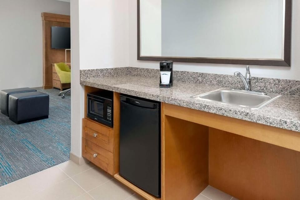Enjoy easy snacks and coffee with the convenient kitchenette nook.