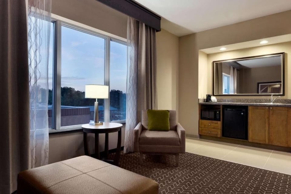 Stretch out in a spacious suite with lounge seating.