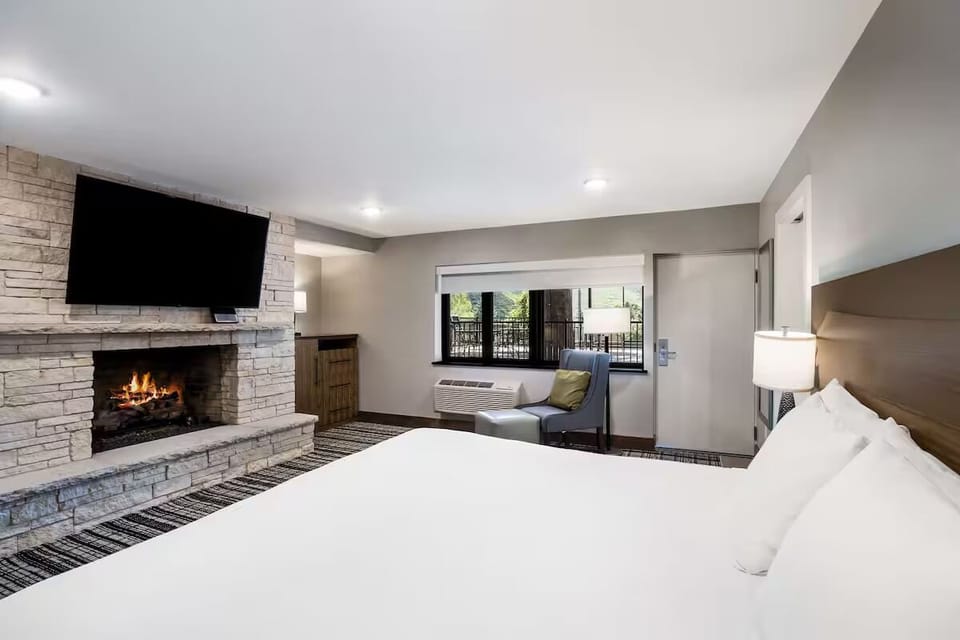 Cozy up by the fireplace after a day of adventure.