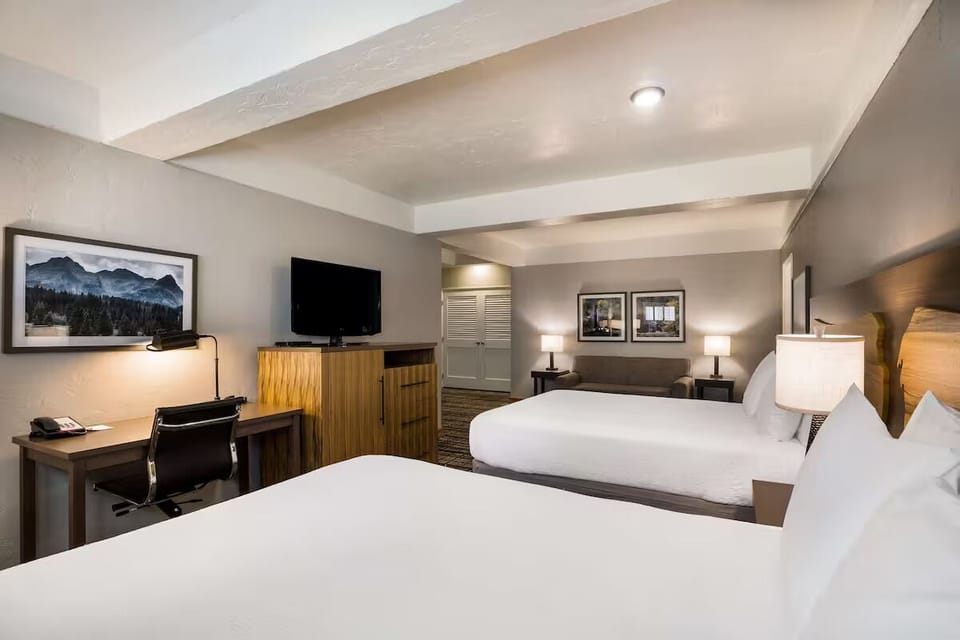 Catch up on emails at the desk, then cozy up to sleep.