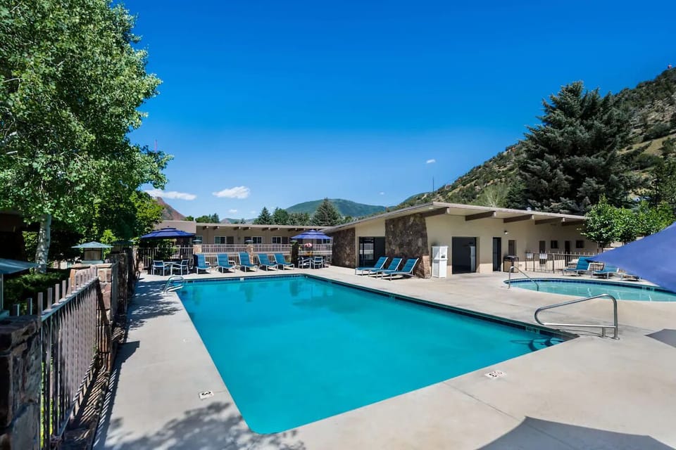 Stretch out on loungers and savor a refreshing swim.