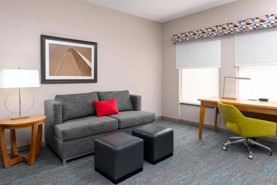 Unwind on the cozy sofa after a productive work session.
